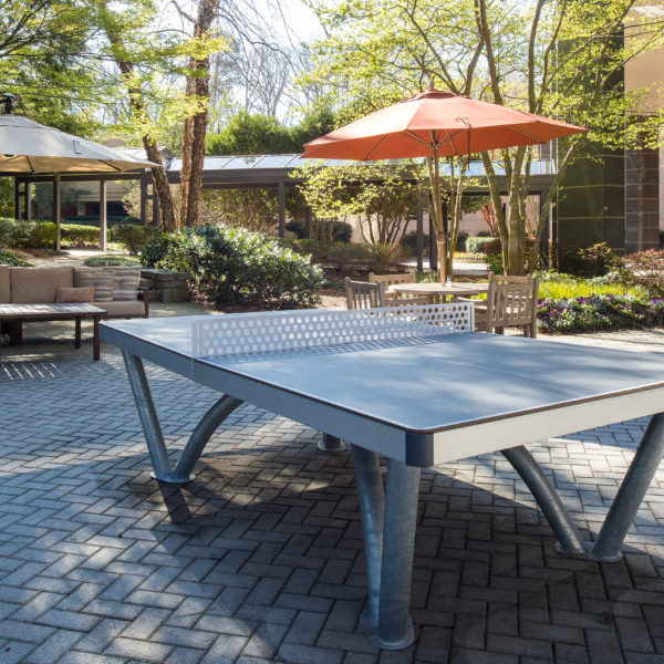 The Premier Plaza outdoor courtyard complete with ping pong tables in Atlanta.